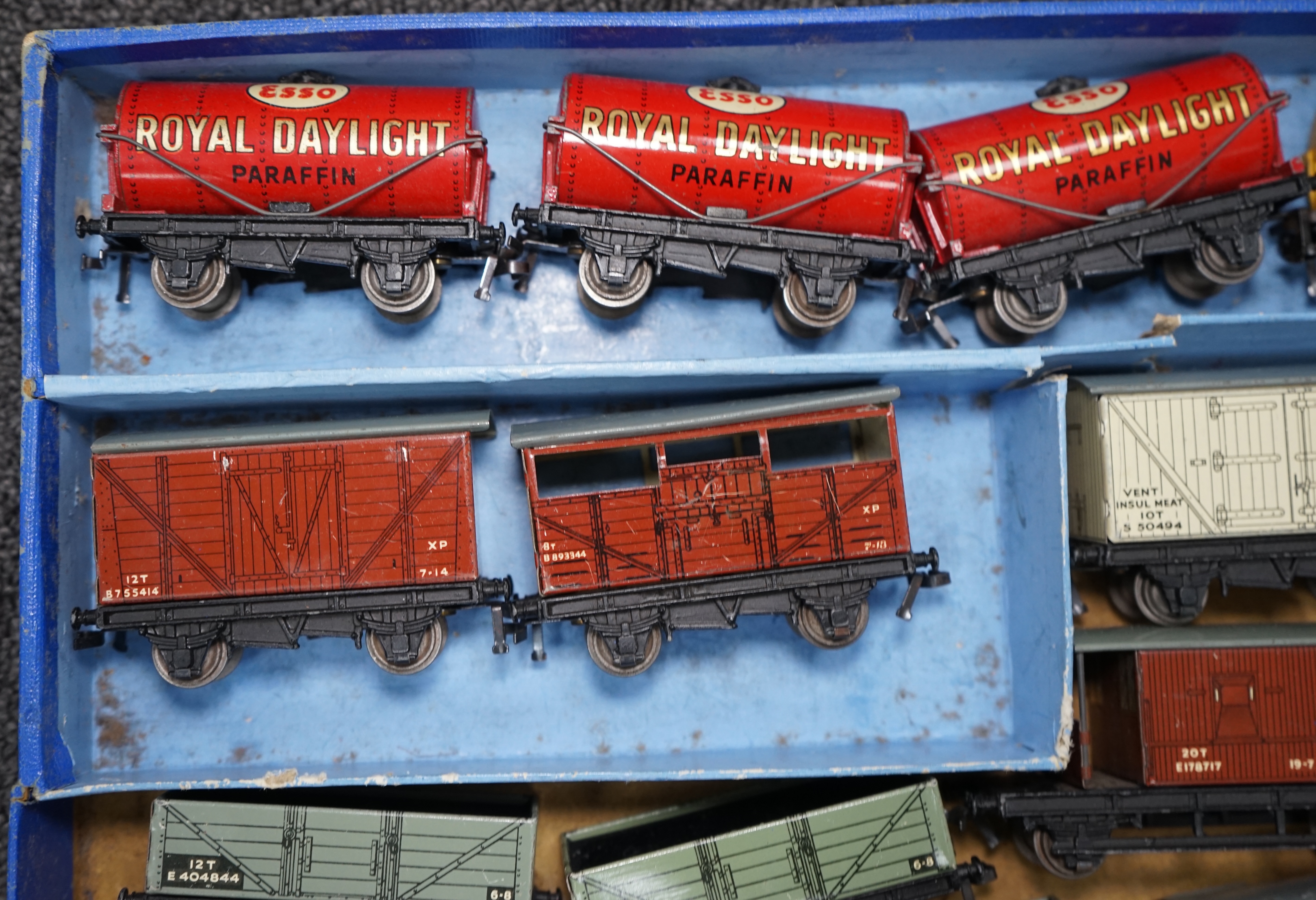 A collection of Hornby Dublo and Tri-ang Railways 00 gauge railway contained within two original boxes; a Hornby Dublo EDG17 Tank Goods Train B.R. set, contents include a BR Standard Class 4, 80054, fourteen tinplate fre